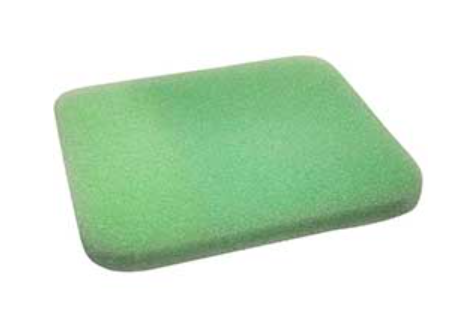 Green foam filter on a white background